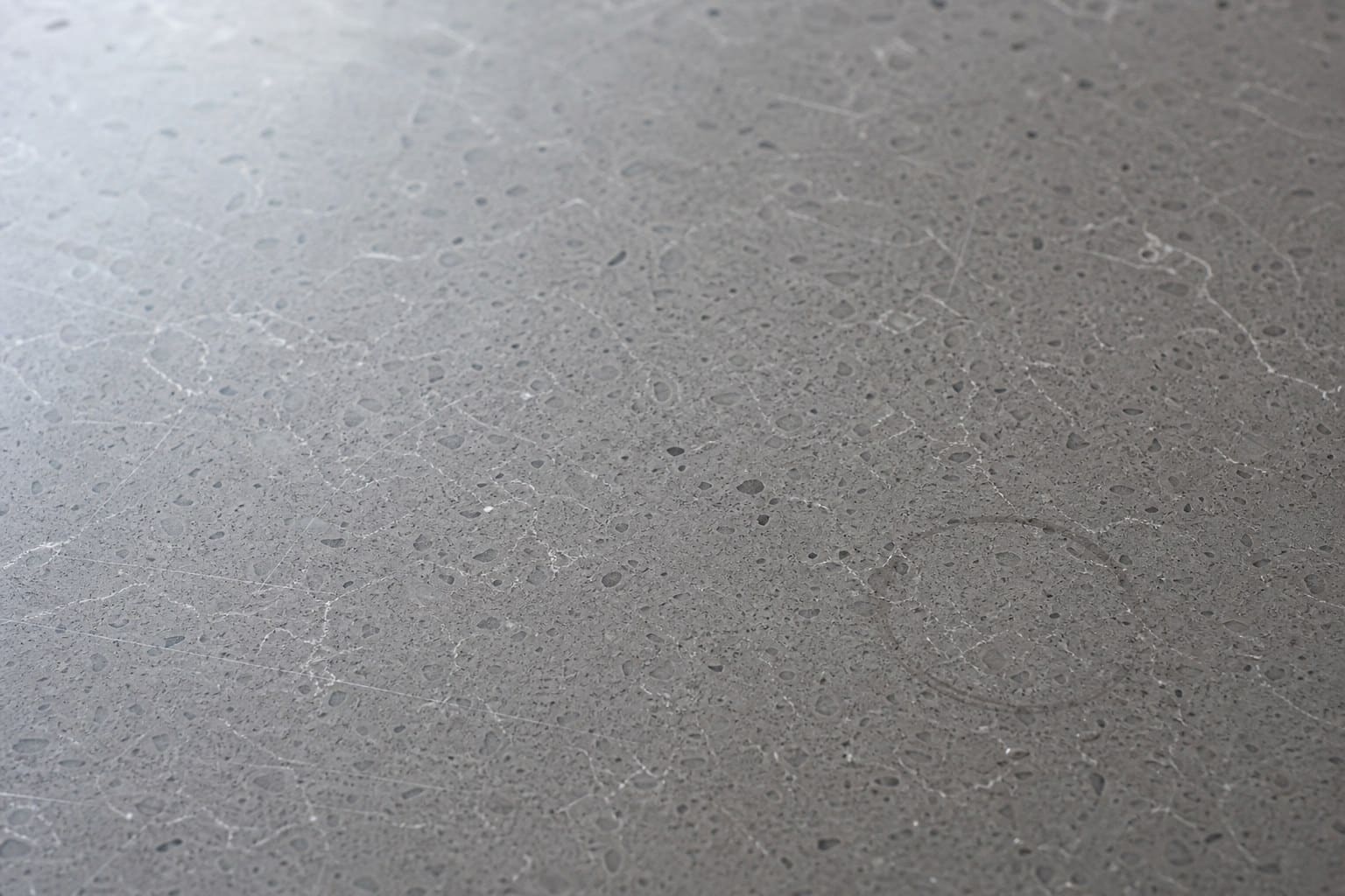 Cool-grey quartz countertop detail in a Santa Clara kitchen